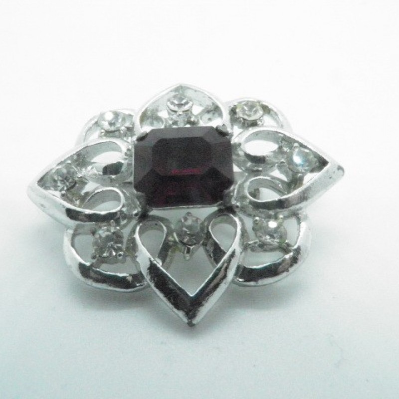 Silver and ruby stone pin